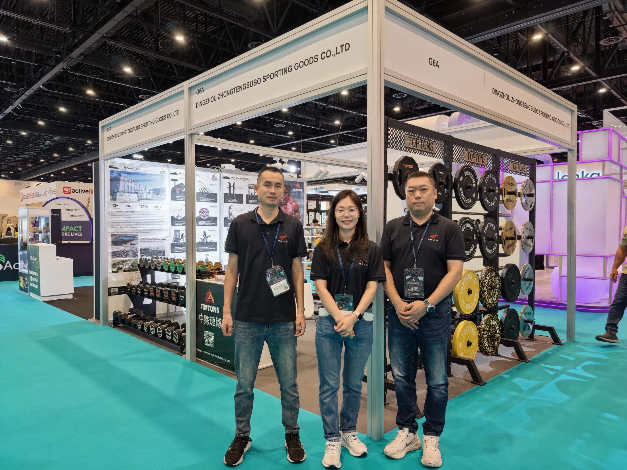 TOPTONS team at an international trade show booth